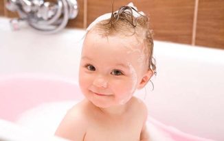 cute baby in bath tub