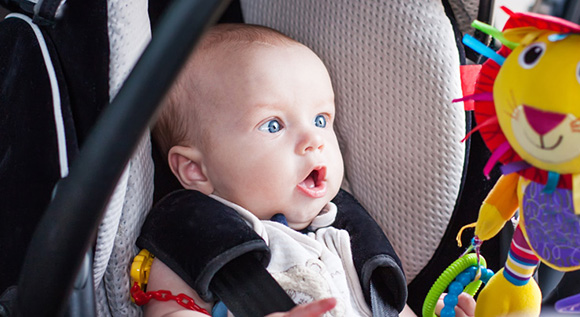 baby boy in car seat