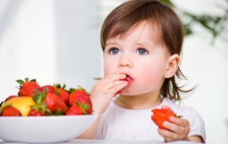 child-eating-fruit