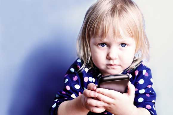 02 toddler-holding-cell-phone